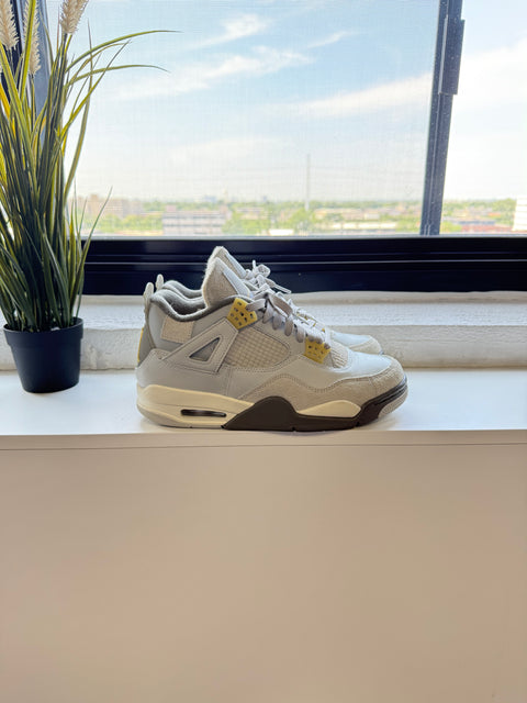 ONE OF A KIND JORDAN 4 RETRO SE CRAFT PHOTON DUST (USED)